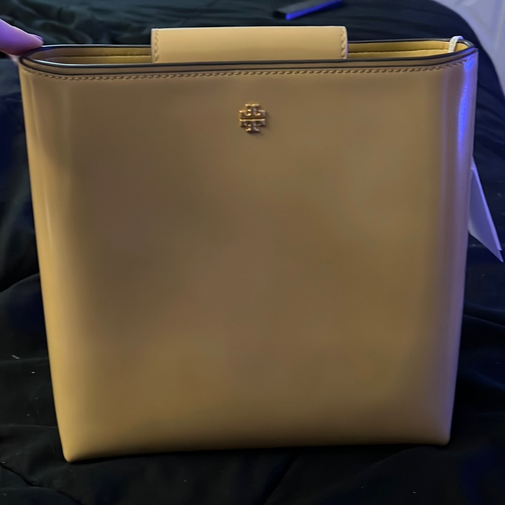 The brand is a Troy Butch, tan, in perfect condition. Never used